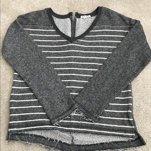 Sweater with fringed ends